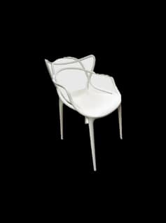 Kartell Masters chair in white, showing the looped branch-like back